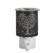 Black electric wax warmer with a tree of hearts design on a white plug-in base. The intricate cutout creates a cozy, inviting glow.