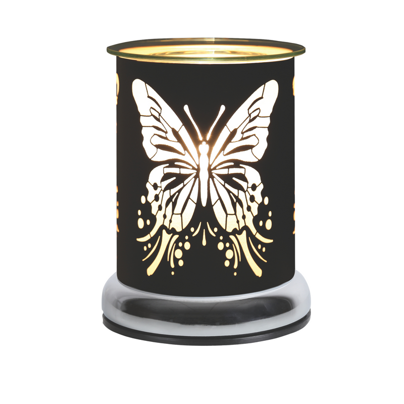 A decorative black metal cylindrical electric wax melt warmer featuring a glowing butterfly cutout design. The warm light creates an elegant and soothing ambiance.