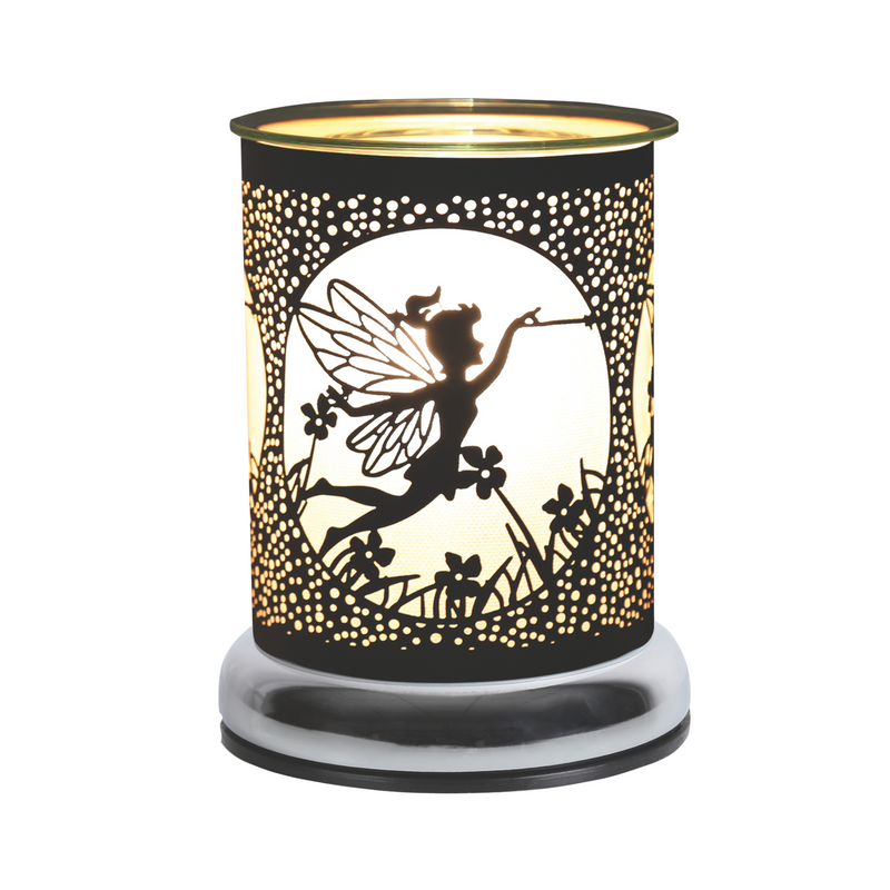 A black fairy-themed electric wax melt warmer with intricate cutout designs, including a fairy with wings among flowers. The warm light creates a magical ambiance.