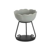 Elegant grey ceramic wax melt bowl with scalloped edges on a black metal stand. The modern design conveys simplicity and sophistication.