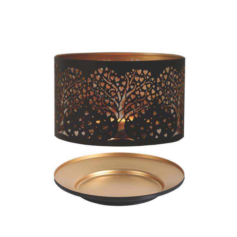Black candle shade with heart-patterned tree cutouts and a warm glow from within. Accompanied by a matching gold-colored round base. Elegant and cozy.