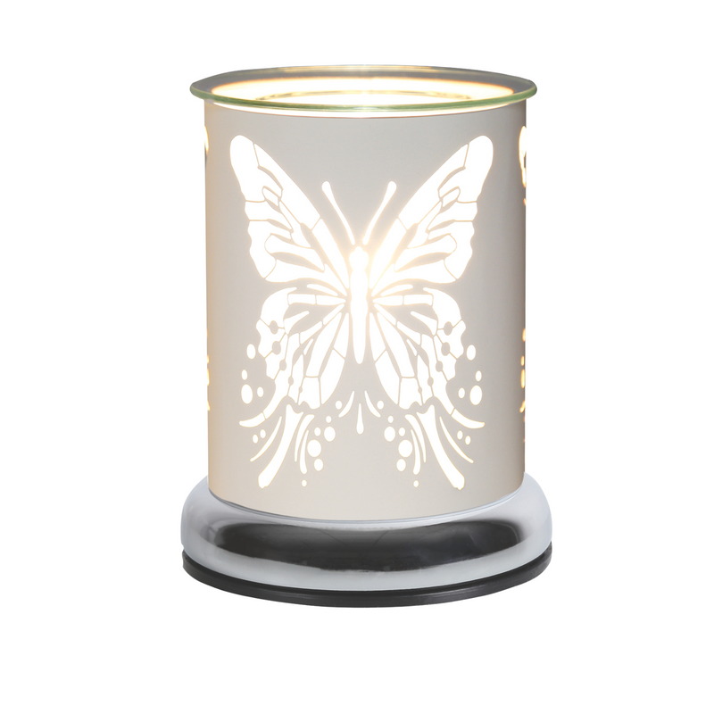 A cylindric electric wax melt warmer with a butterfly design cut out, emitting warm light. The intricate patterns create a cozy and elegant ambiance.