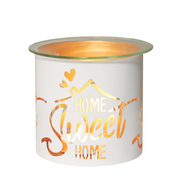 White candle holder and wax melt warmer  with  a gold inner and cut-out letters reading "Home Sweet Home" and hearts, glowing warmly, creating a cozy and welcoming atmosphere.