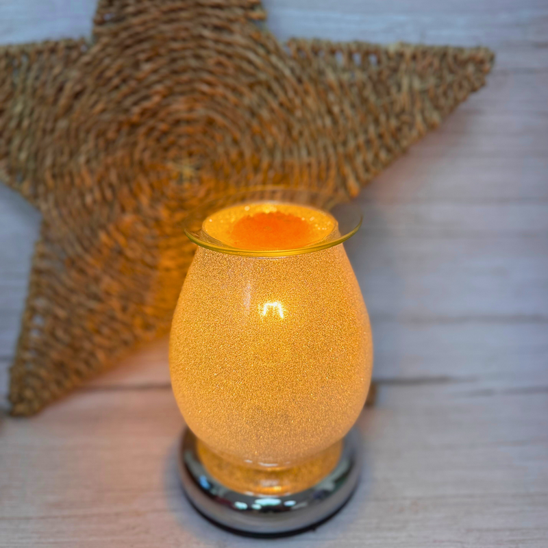 An image showing Little House of Fragrance Aventos Fragrance Scent Sizzlers being used in an electric warmer