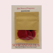 Scented Hoover discs fresheners  in a 'Little House of Fragrance' package on a light pink background