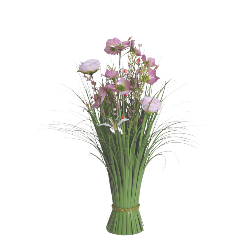 A bouquet of pink and purple rose flowers with delicate petals is surrounded by green grass-like leaves. The stems are tied with a woven band, creating a fresh, elegant display.